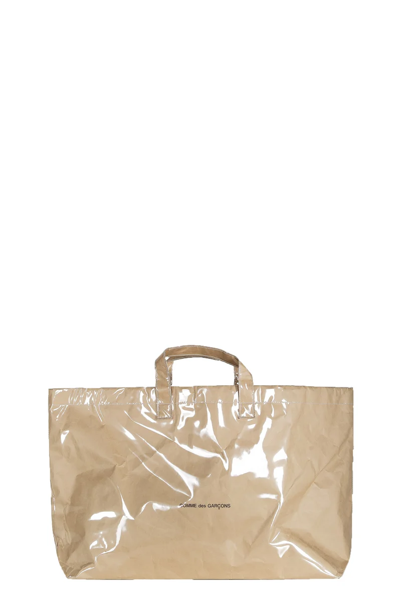 Comme Des Garçons Handtasche mit Logo-Print beige