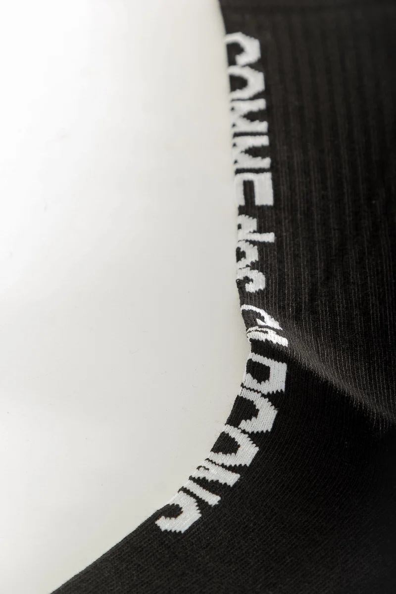 Comme Des Garçons Socken mit Logo-Print schwarz