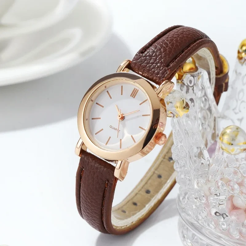 Elvara Damen Armbanduhr mit rundem Zifferblatt und Lederarmband