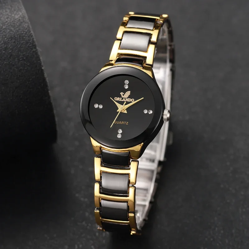 Damen Quarzuhr mit rundem Zifferblatt und Metallarmband