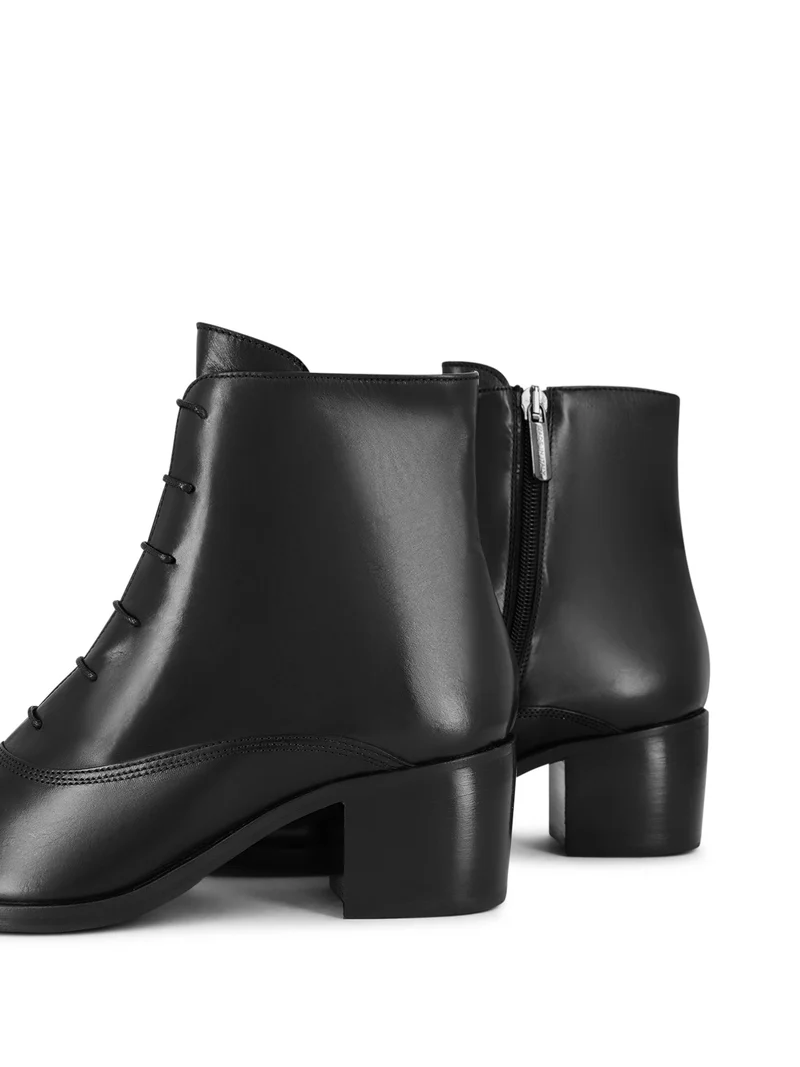 ARMAND BLACK