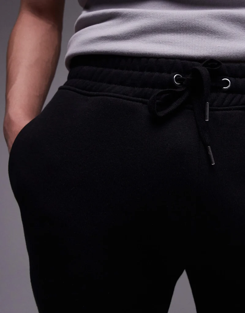 Topman classic fit jersey short with raw hem in black