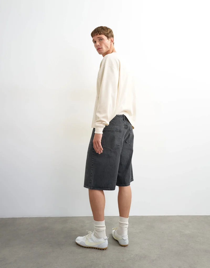 Topman rigid baggy denim short in washed black