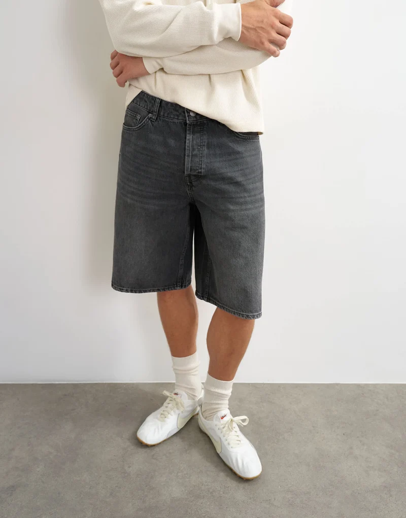Topman rigid baggy denim short in washed black