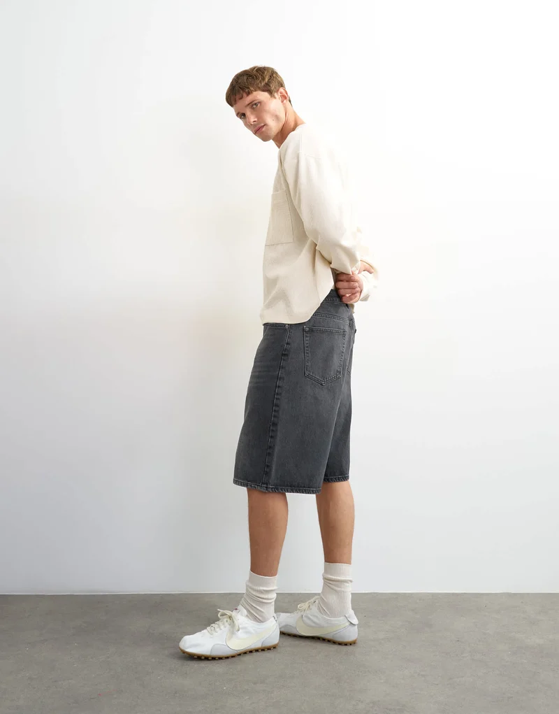 Topman rigid baggy denim short in washed black