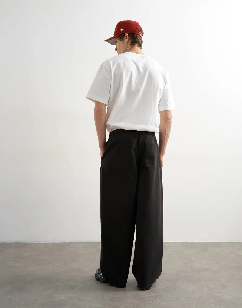 Topman baggy fit herringbone trousers in black