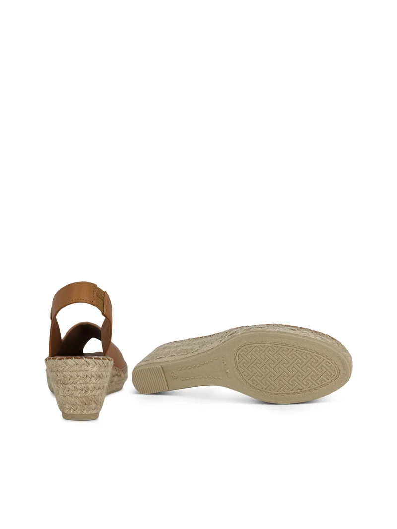 BERNIA TAN