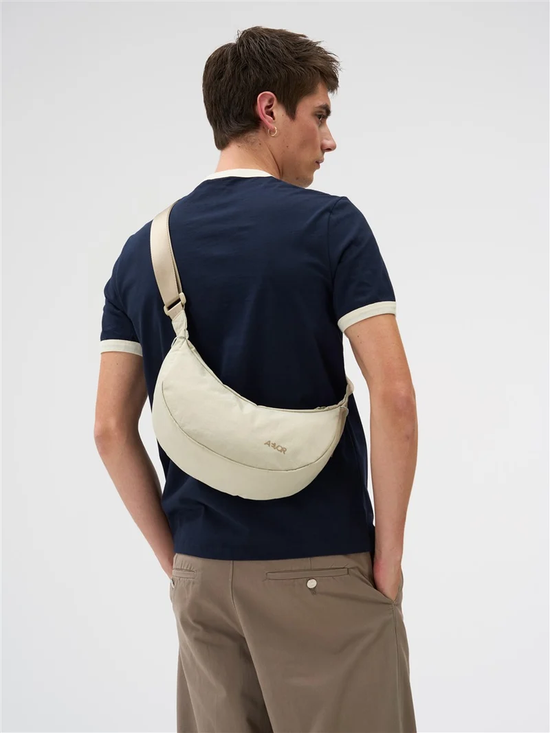 AEVOR Sling Bag Small Off-White