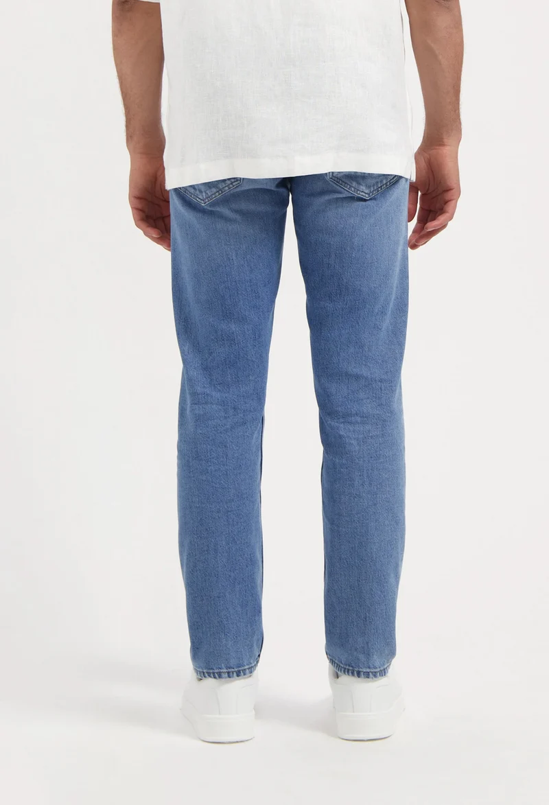 MUD JEANS Hank Mid Tapered Medium Aged