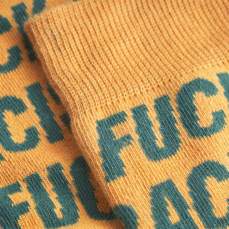 DEDICATED Socks Sigtuna Fuck Racism Pattern Honey Yellow